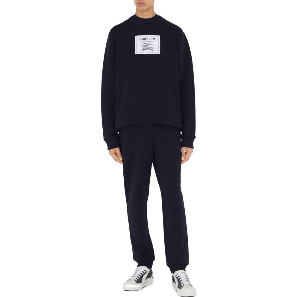 Lookbook Pantalones Jogger Burberry SS23 de Punto de Talle Alto Azul Marino. 80654781