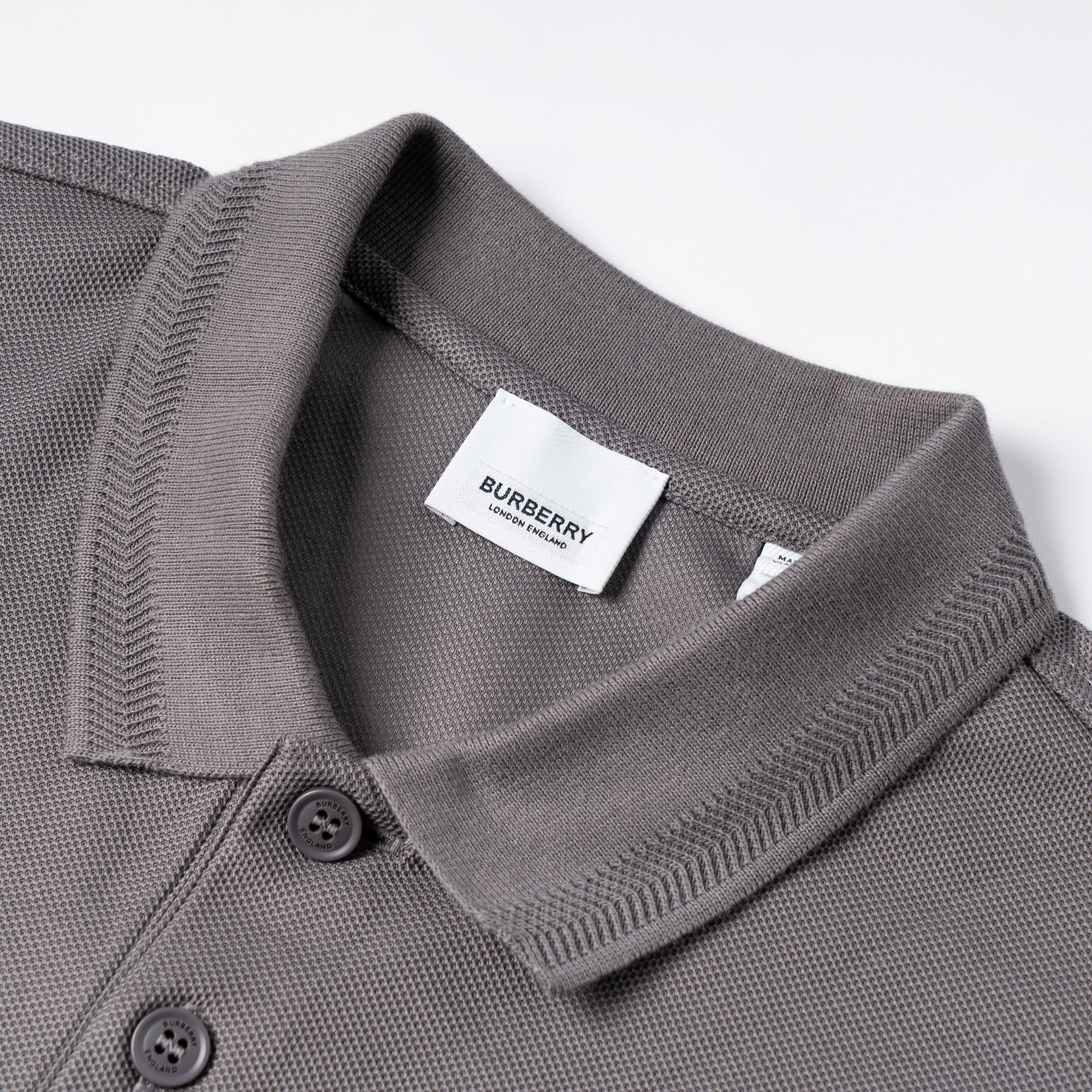 Sizing Burberry SS23 Baju Polo Lengan Pendek Logo Sulam Kelabu. 80675841