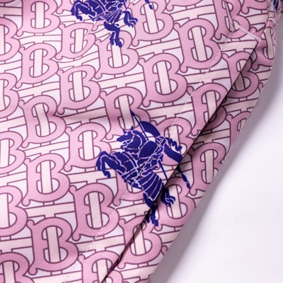 Burberry SS23 Red Pattern Print Drawstring Swim Shorts for Men. 80722471 1