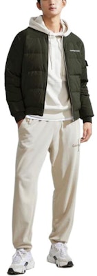 Calvin Klein Olive Green Logo Print Quilted Down Jacket Unisex Winter Collection J324342-LDD Lookbook Calvin Klein Olive Green Logo Print Quilted Down Jacket Unisex Winter Collection J324342-LDD