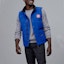 Lookbook Chaqueta ligera Canadá Goose Freestyle azul con logo rojo, impermeable y cierre. 4154MPB-64