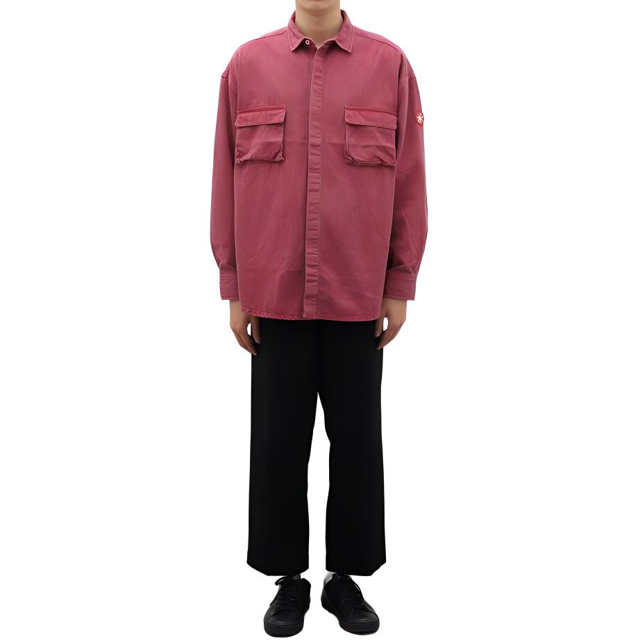 Shop Kemeja Denim Unisex Cav Empt dengan Kantong Double dan Kancing Tersembunyi. CES24SH03