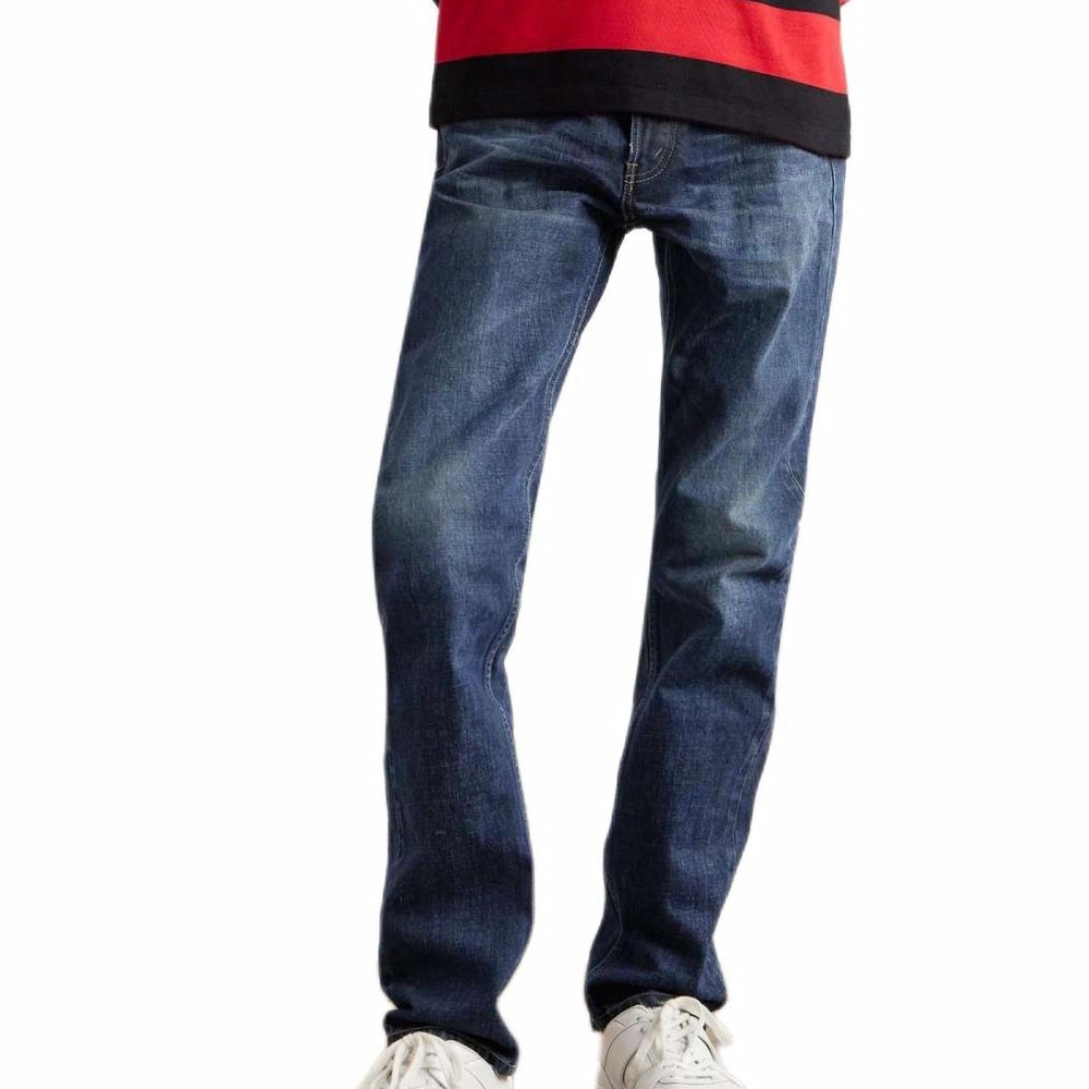 Shop CELINE 低腰紐扣寬松牛仔褲 經典靛藍色 2N785787D-07ID