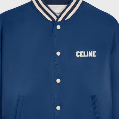 CELINE Men’s Navy Blue SS24 Logo Print Loose-Fit Varsity Jacket. 2W22C227R-07MR Sizing CELINE Men’s Navy Blue SS24 Logo Print Loose-Fit Varsity Jacket. 2W22C227R-07MR