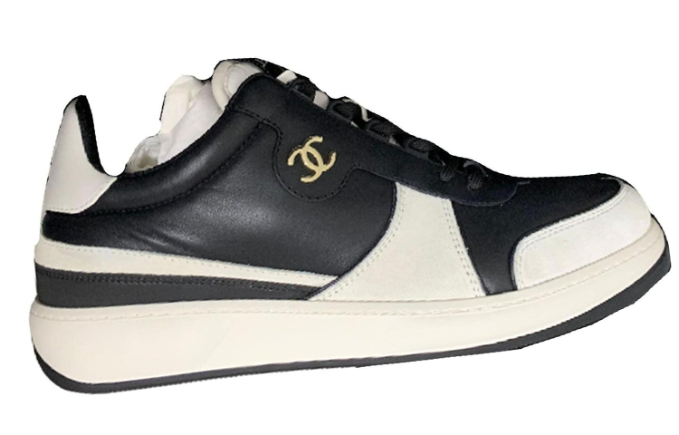 Purchase 香奈儿黑白拼色低帮皮革运动鞋 G45213-B14072-NR406
