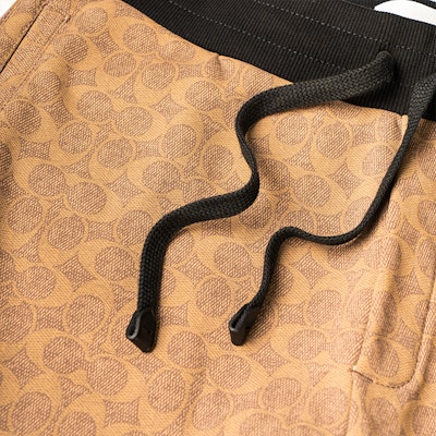 COACH 2022秋冬纯色经典Logo针织长裤棕色款 CB491-RYU Sizing COACH 2022秋冬纯色经典Logo针织长裤棕色款 CB491-RYU