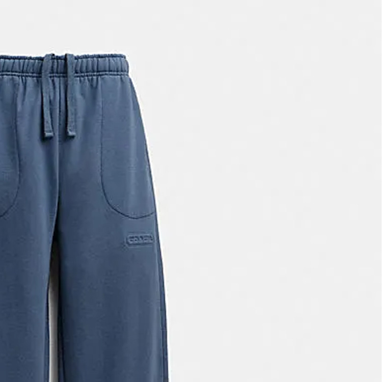 Purchase 蔻驰 FW23 标志印花抽绳针织休闲长裤 CJ379-BLU