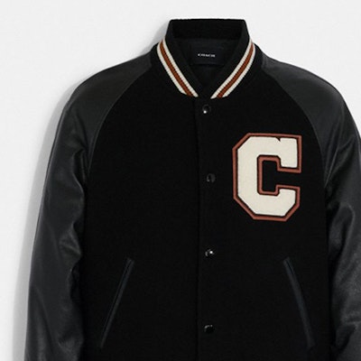 COACH SS23 Black Baseball Jacket with Logo Patch and Button Closure. CF802-BLK Sizing COACH SS23 Black Baseball Jacket with Logo Patch and Button Closure. CF802-BLK