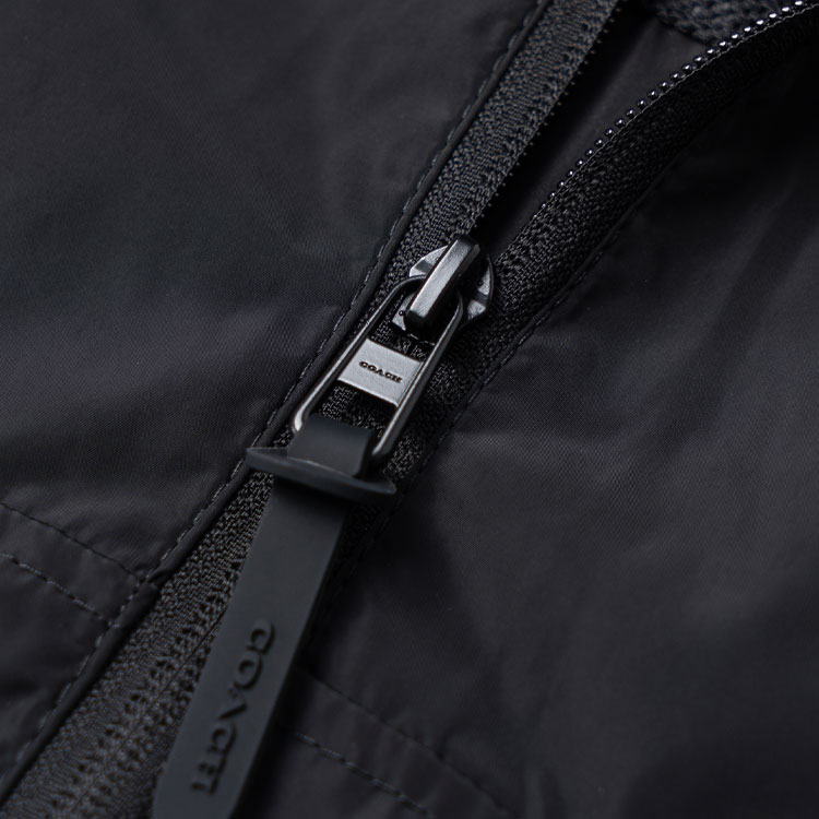 Shop COACH SS23  Black Hooded Logo Patchwork Jacket. CI360-S8L