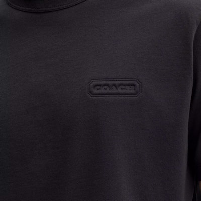 コーチ ユニセックス ブラック クルーネック Tシャツ 無地ロゴデザイン入り. CL685-BLK Sizing コーチ ユニセックス ブラック クルーネック Tシャツ 無地ロゴデザイン入り. CL685-BLK