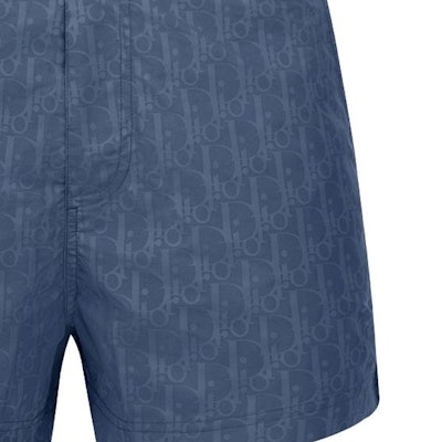 DIOR Celana Pendek Biru Mid-Waist dengan Logo Cetak di Seluruhnya. 293B102AB041-C531 Sizing DIOR Celana Pendek Biru Mid-Waist dengan Logo Cetak di Seluruhnya. 293B102AB041-C531