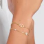 Lookbook DIOR PETIT CD Gelang Logam Emas Unisex Desain Pasangan. B1133-D301