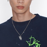 Kalung Liontin Dior x Cactus Jack Perak/Putih N1642HOMMT_D007 Shop Kalung Liontin Dior x Cactus Jack Perak/Putih N1642HOMMT_D007