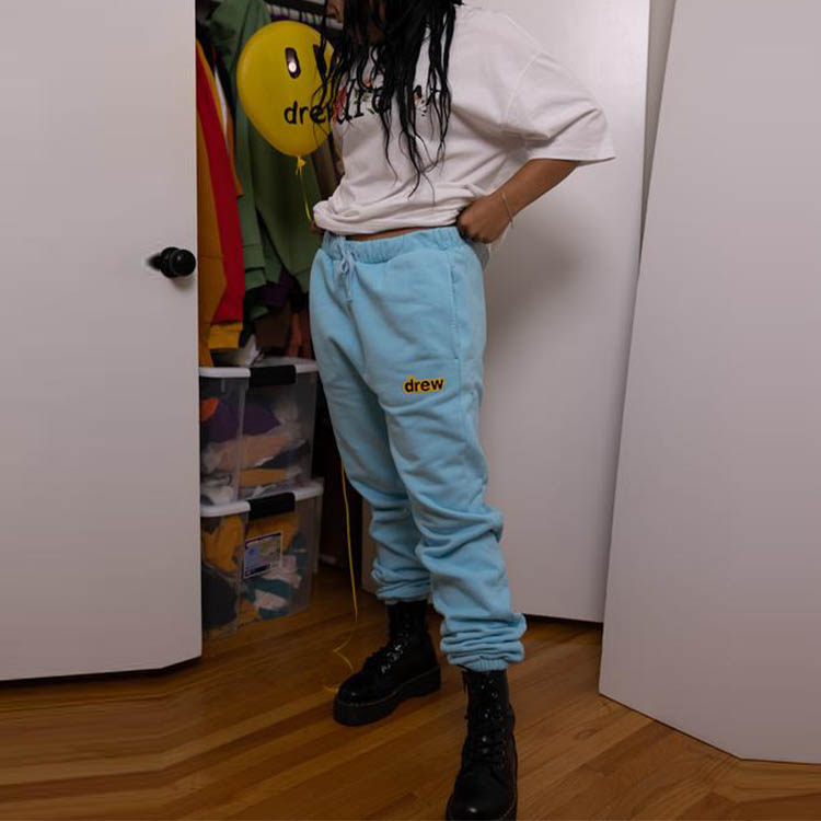 Shop Drew House 海绵宝宝字母徽标男女同款针织运动长裤 - 海军蓝 DR-SS21-101