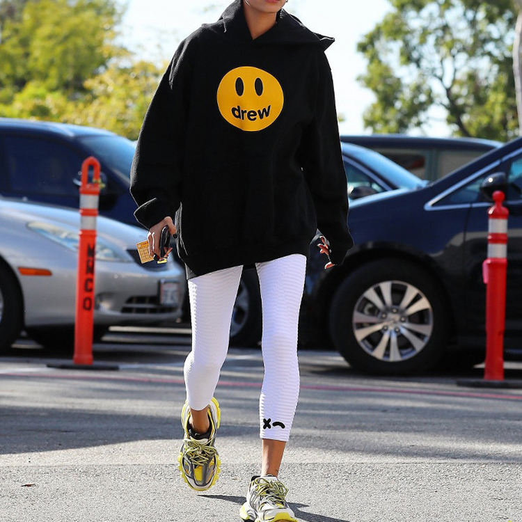 Shop ドリューハウス スマイリープリント ブラック フリース プルオーバー ユニセックスパーカー DR0117