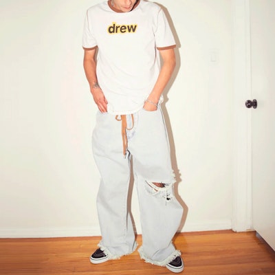 Drew House Smiley Jeans Koyak Ultra Wide Leg Vintage Indigo Unisex Biru. DR-SS22-161 Shop Drew House Smiley Jeans Koyak Ultra Wide Leg Vintage Indigo Unisex Biru. DR-SS22-161