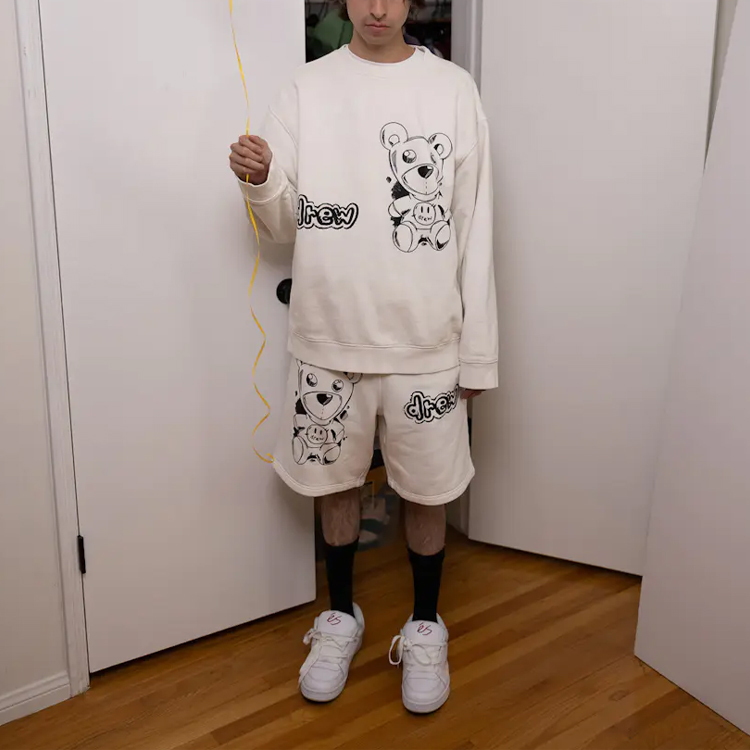 Shop Drew House Celana Pendek Grafis Unisex Off-White SS21. DR-SS21-81