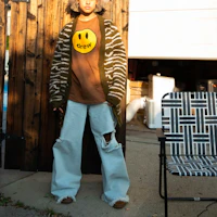 Shop Drew House SS22 Mascot Smiley Print Brown Unisex Tee. DR-SS22-002