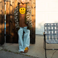 Purchase Drew House SS22 Mascot Smiley Print Brown Unisex Tee. DR-SS22-002