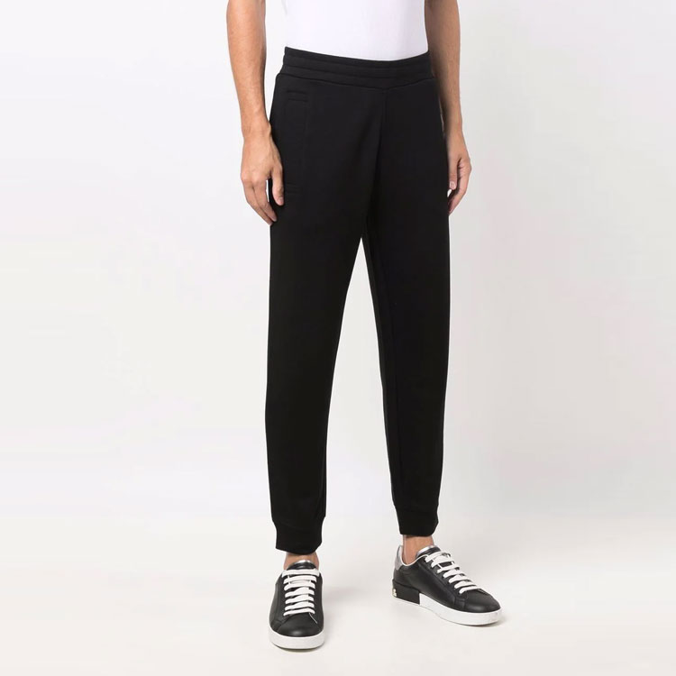 Shop EMPORIO ARMANI Black Mid-Waist Knit Jogger Pants with Minimal Logo. 8N1PS9-1JRIZ-0999