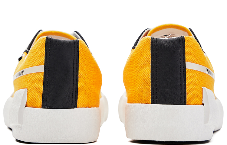 Shop ERKE XTEP Canvas Low 'Negro Amarillo' 11122101510-403