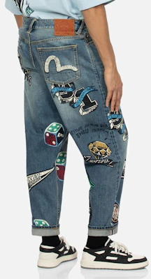 EVISU Denim Biru Relaxed Jeans dengan Cetakan Grafik Permainan. 2ESHTM4JE1091RXDN Purchase EVISU Denim Biru Relaxed Jeans dengan Cetakan Grafik Permainan. 2ESHTM4JE1091RXDN