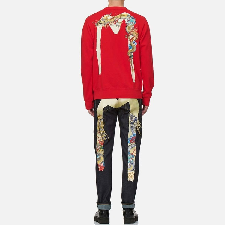 Purchase EVISU Vaqueros de Mezclilla con Gran M Estampada en Azul. 2EAHTM1JE90317CS