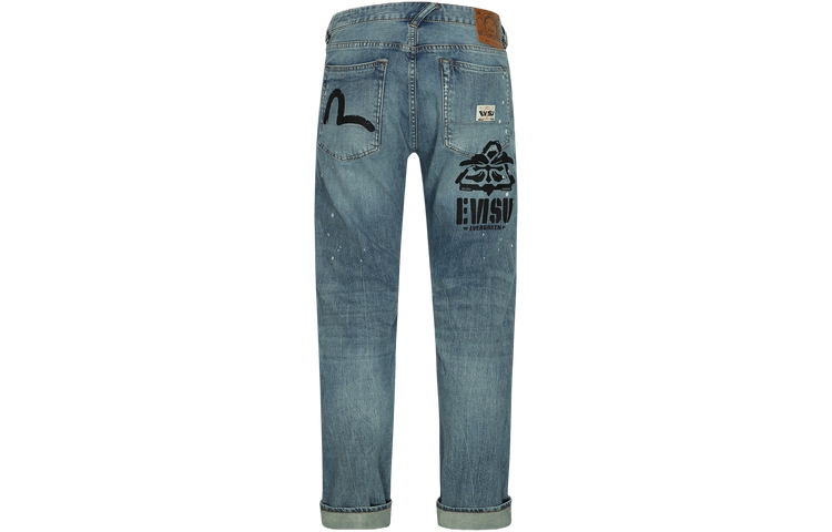 EVISU  Slim Fit Distressed Splash Print Jeans in Denim Blue. 2ESHTM4JE807417DP