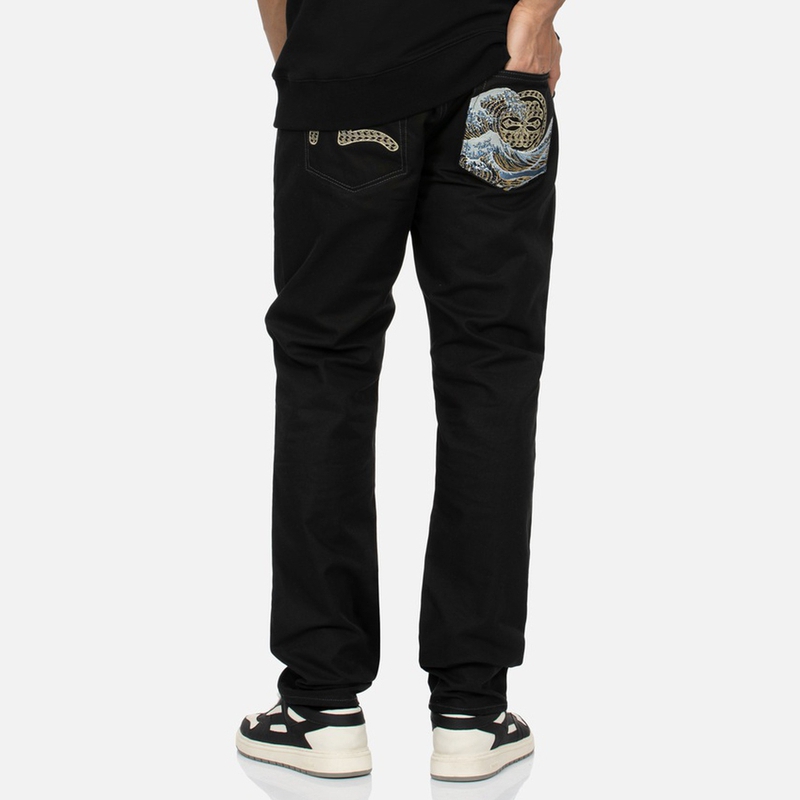 Shop EVISU 海浪圖案與海鷗刺繡寬鬆版型長褲 2ESHTM4PT7042TPCT