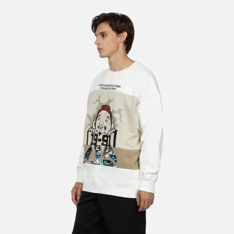 Shop Sweatshirt EVISU dengan Desain Patchwork Kepala Buddha & Print Burung Camar 2EAHTM3SW8040LFCT