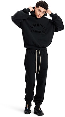 Fear of God Essentials Arch Logo Hoodie Jet Black Shop Fear of God Essentials Arch Logo Hoodie Jet Black
