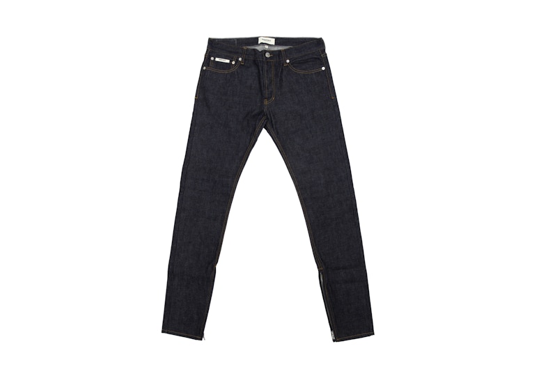 Fear of God ESSENTIALS Raw Denim Tapered Jeans Indigo