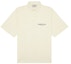 Buy Fear of God ESSENTIALS Short Sleeve Boxy Polo Buttercream