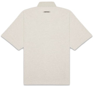 Fear of God ESSENTIALS Polo Manga Corta Boxy Avena Heather Order Fear of God ESSENTIALS Polo Manga Corta Boxy Avena Heather