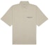 Buy Fear of God ESSENTIALS Short Sleeve Boxy Polo String/Tan