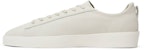 Fear of God Tennis Low 'Cement' dalam warna Kelabu. ES80-001NUB-024