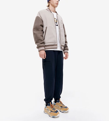 FILA FUSION Loose Fit Striped Baseball Jacket in Khaki Gray. T11M242702F-GY Shop FILA FUSION Loose Fit Striped Baseball Jacket in Khaki Gray. T11M242702F-GY