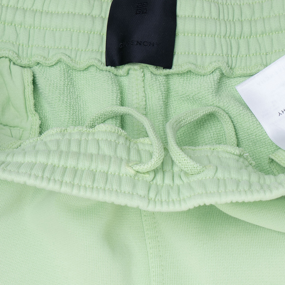 Purchase GIVENCHY x Josh Smith FW22  Green Slim Jogger Pants with Art Embroidery Patch. BM51173Y69-340