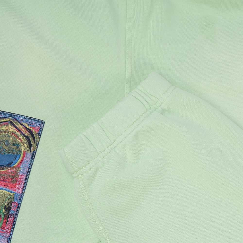 Details for GIVENCHY x Josh Smith FW22  Green Slim Jogger Pants with Art Embroidery Patch. BM51173Y69-340
