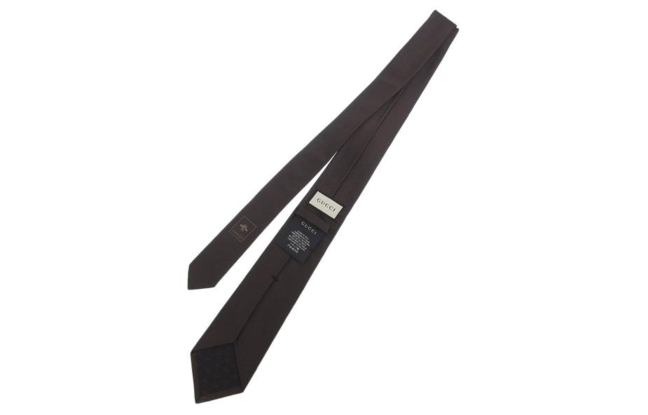 Shop GUCCI  Silk Tie with Logo Design in Dark Brown. 5505684e0022000