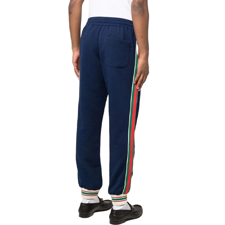 Shop GUCCI SS22  Blue Knit Track Pants with GG Stripe Trim. 663569-XJDE9-4464