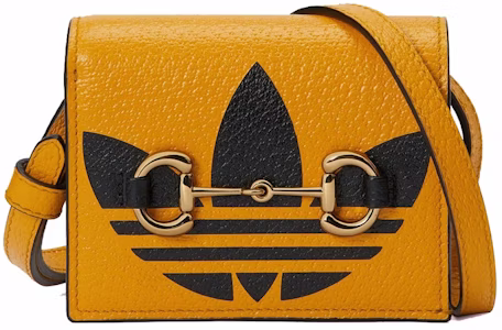 Tarjetero Gucci x adidas con Horsebit Amarillo/Negro Buy Tarjetero Gucci x adidas con Horsebit Amarillo/Negro