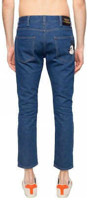 구찌 x 디즈니 테이퍼드 블루 진 지퍼 및 패치 디테일. 408637-XDA13-4206 Purchase 구찌 x 디즈니 테이퍼드 블루 진 지퍼 및 패치 디테일. 408637-XDA13-4206