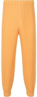 Homme Plissé Issey Miyake SS24 Solid Pleated Relaxed Pants Melon Orange Mens. HP46JF129-33 Homme Plissé Issey Miyake SS24 Solid Pleated Relaxed Pants Melon Orange Mens. HP46JF129-33