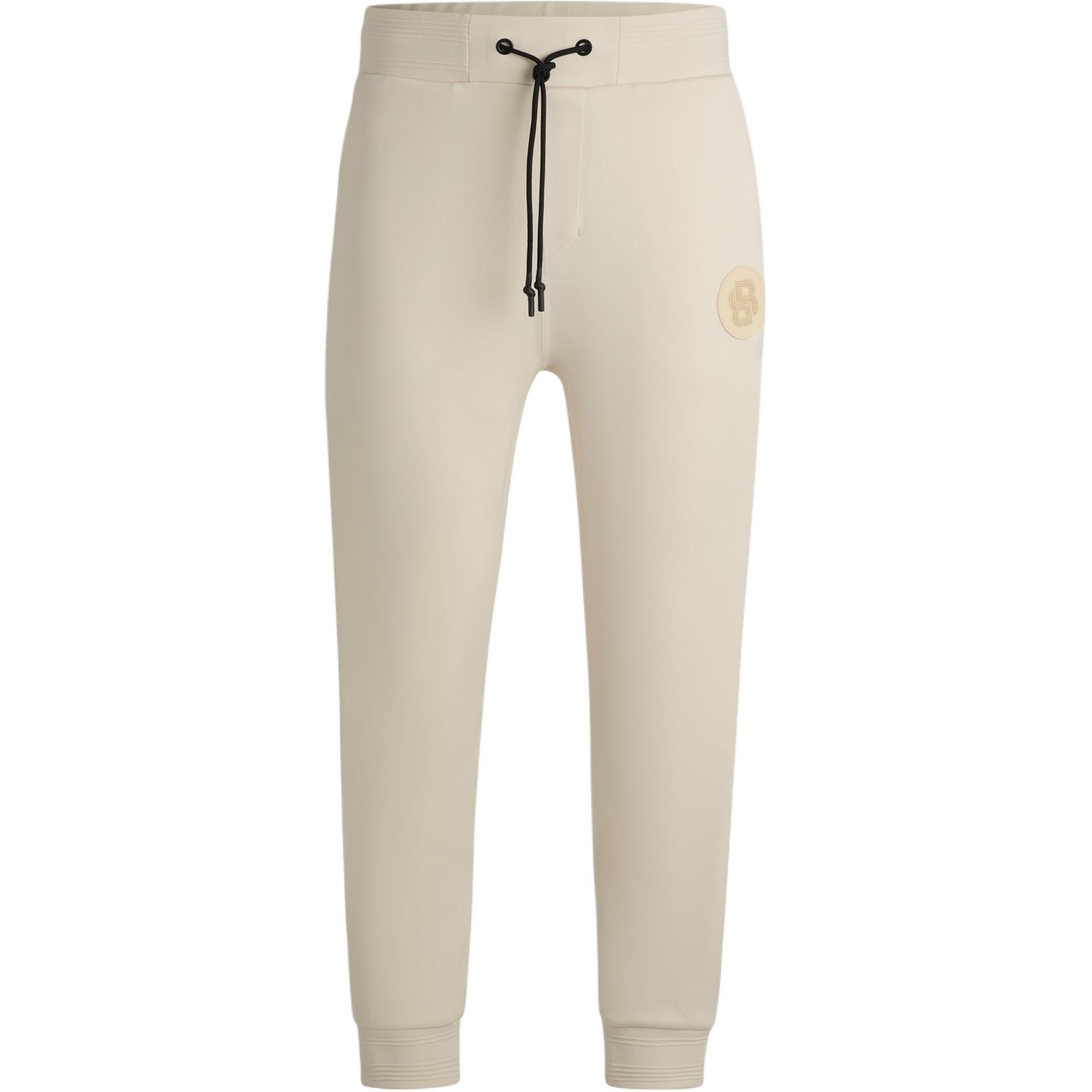 HUGO BOSS  Beige Knit Joggers with Logo Patch and Lace-Up Design. 50521382-131