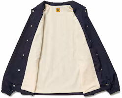 Shop HUMAN MADE FW22 北极熊印花防风教练夹克男女同款长袖外套. HM24JK002