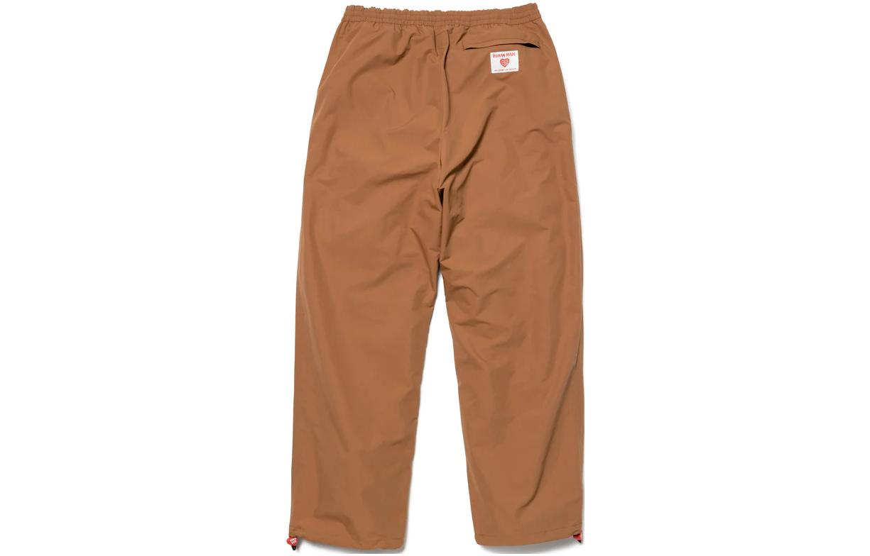 Lookbook HUMAN MADE FW23 Unisex Logo Drawstring Jogger Pants - Casual Fall/Winter Wear. HM26PT002