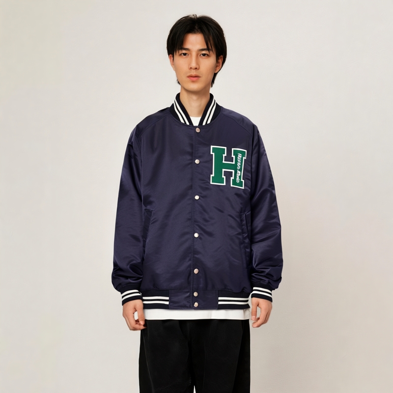 Shop HUMAN MADE FW24 Unisex Jacket with 3D Letter Logo and Snap Button Closure. HM28JK008