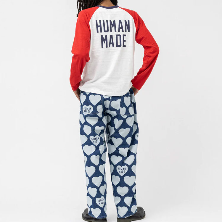 Purchase Camiseta Unisex Manga Larga Raglán HUMAN MADE SS23 con Estampado Gráfico. HM25CS024