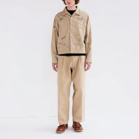 Shop HUMAN MADE SS24 满版字母印花纽扣短夹克 男女同款 HM27JK010